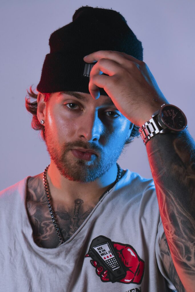 Arm tattoos for men: man with a tattooed arm and chest