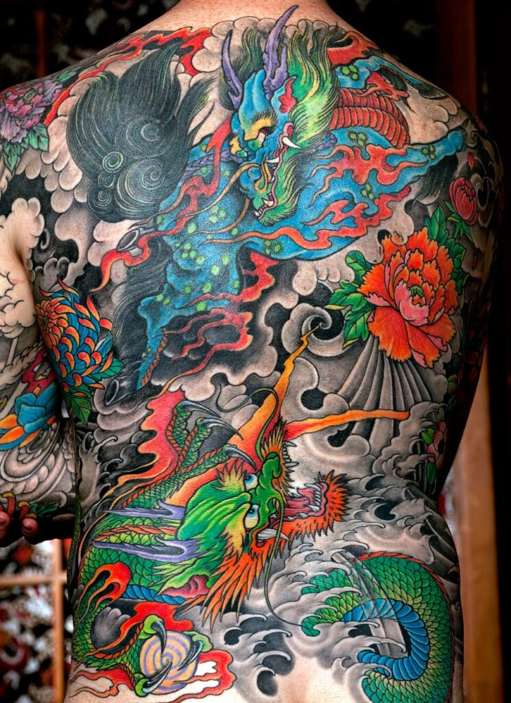 Custom Japanese backpiece tattoo in bold color