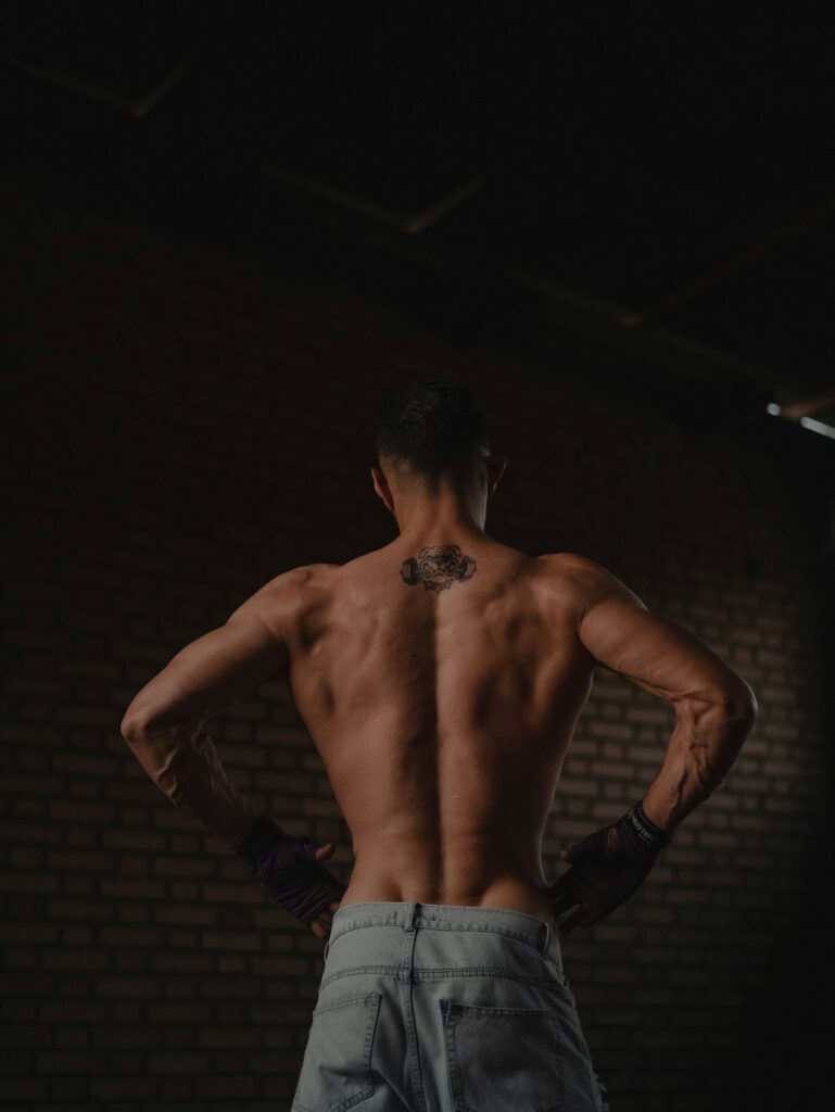 Small Tattoo Between the Shoulders