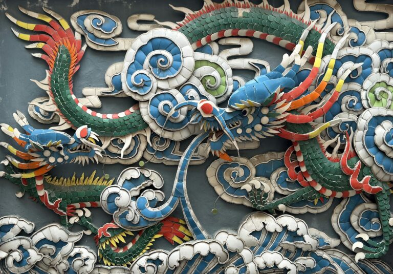 Dragon tattoo meaning: colorful Chinese dragon sculptures