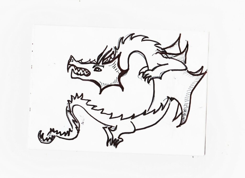 Black and white dragon tattoo sketch on paper