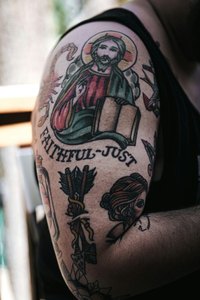 Traditional religious tattoo with the words Faithful and Just