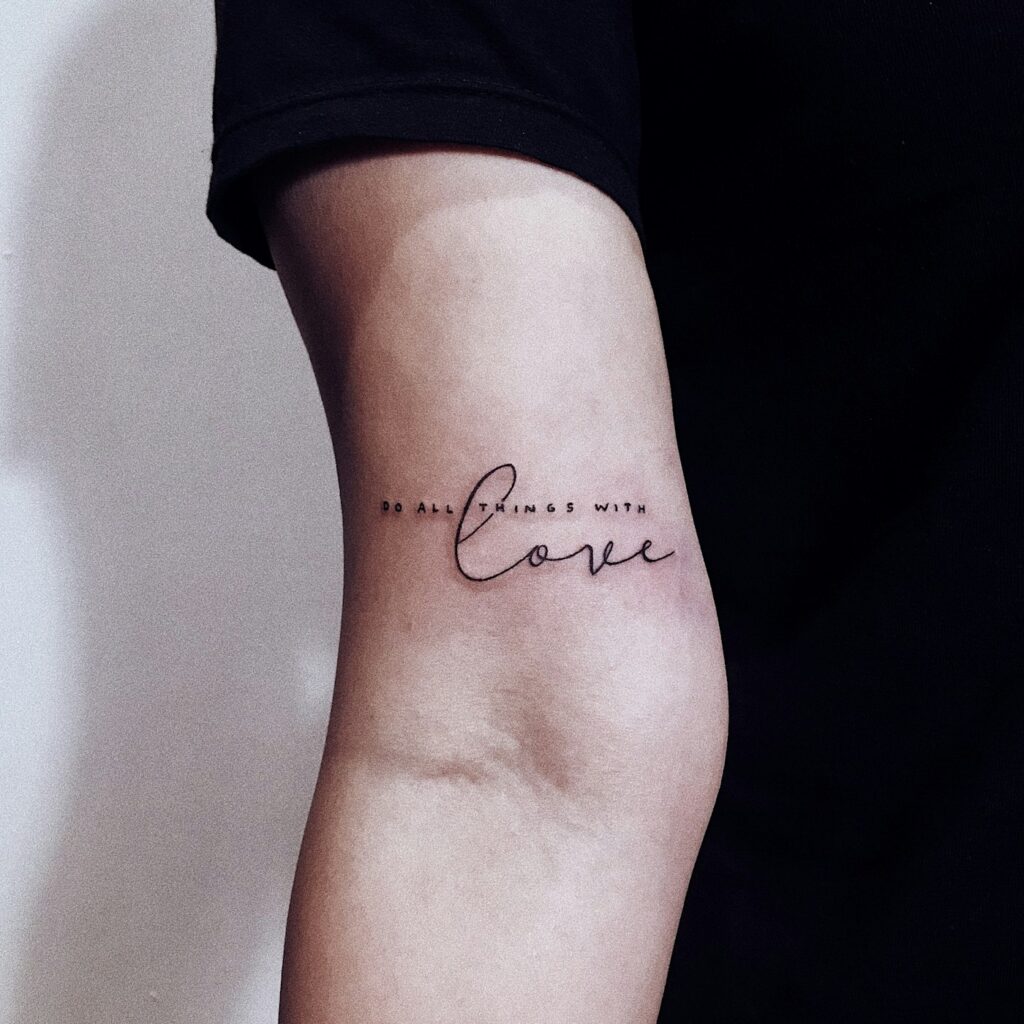 Fine line script tattoo on the inner arm
