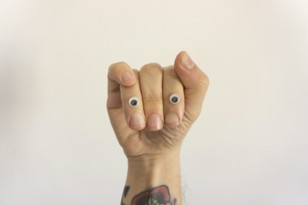 Small tattoos on the fingers