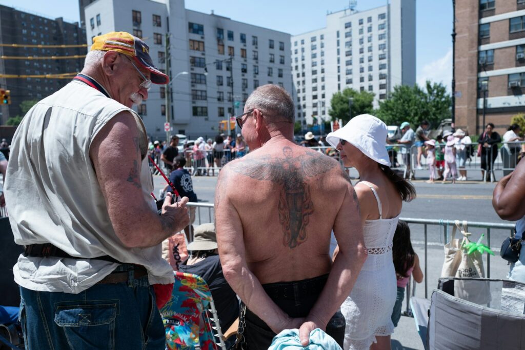 Older man with a large back tattoo outdoors