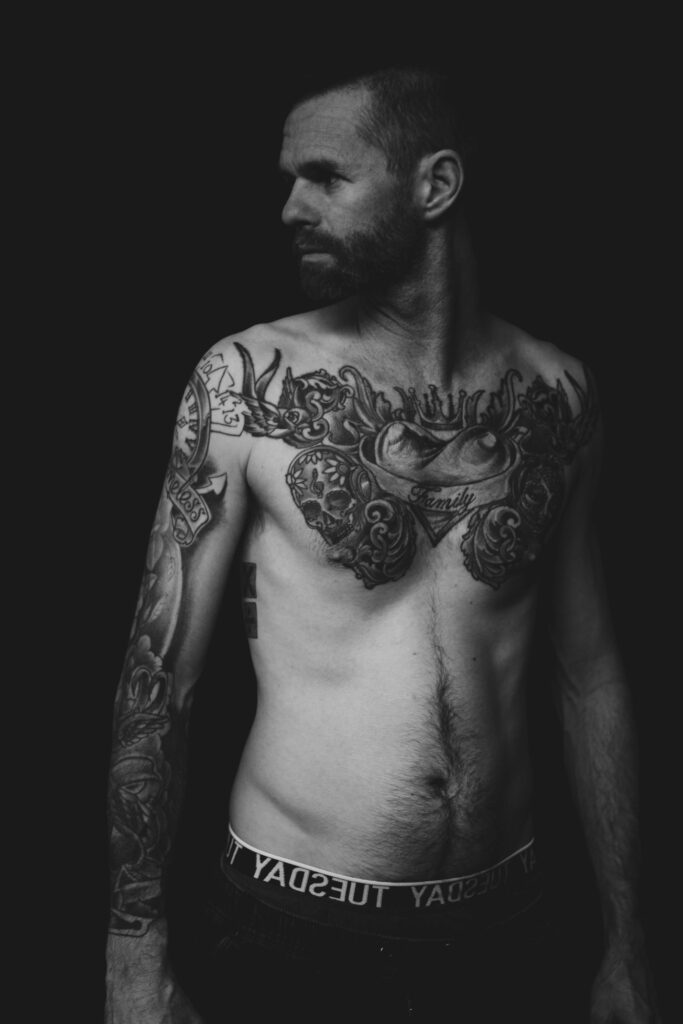 Full black and grey chest piece on a man