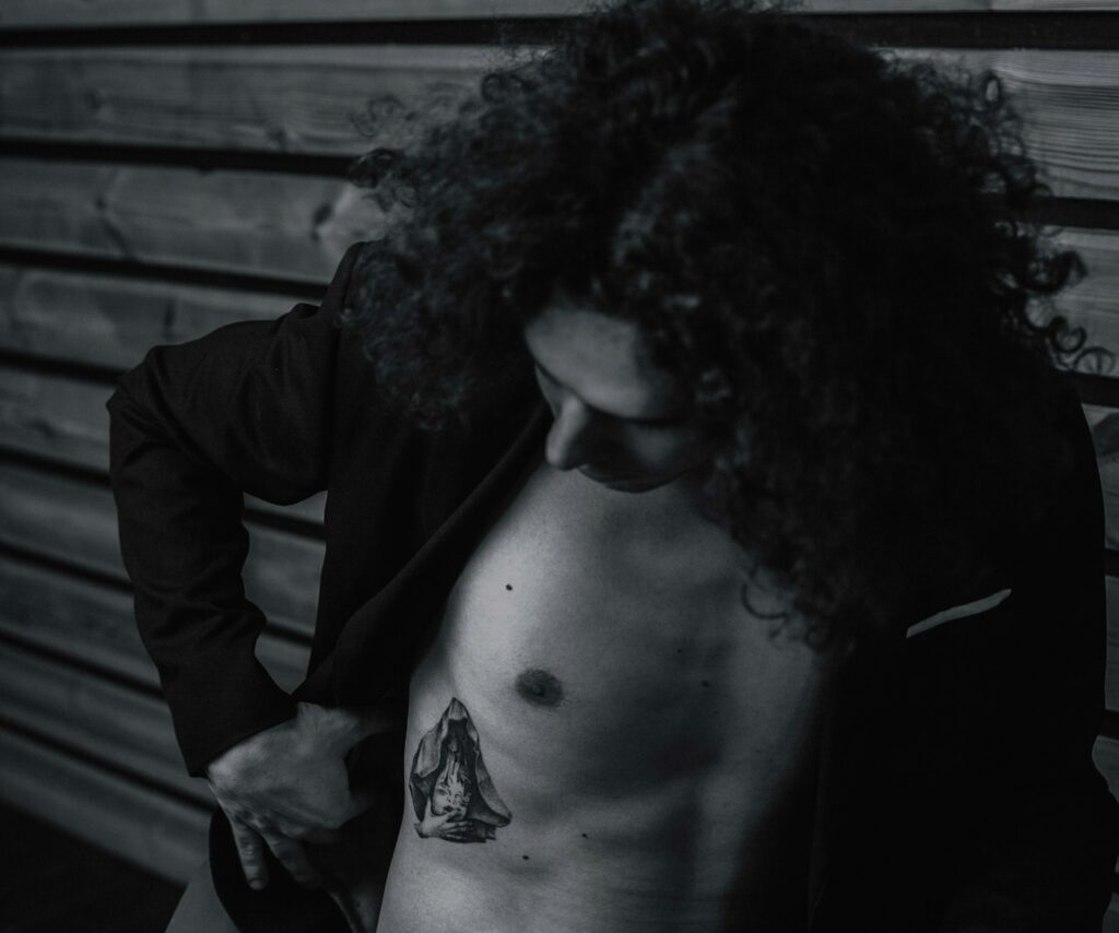 Geometric line tattoo on a man's chest
