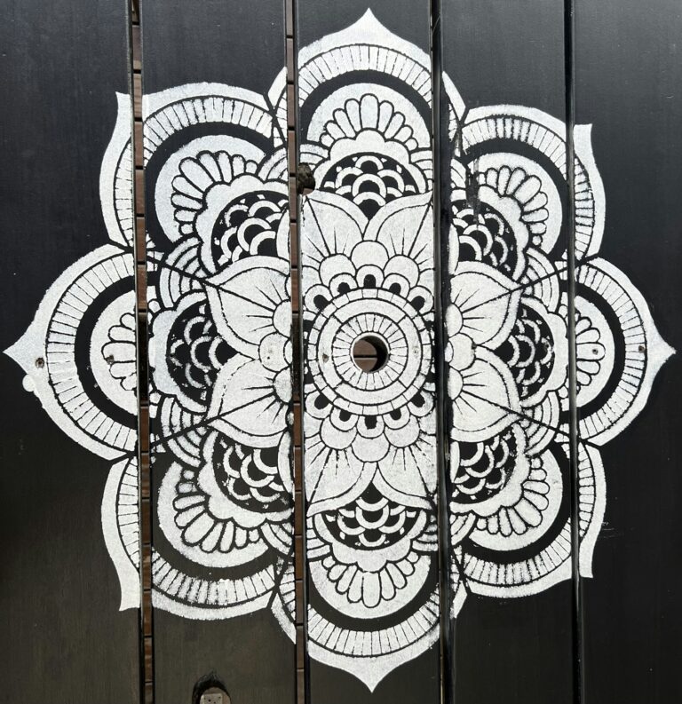 Geometric tattoo inspiration: hand drawn black and white mandala