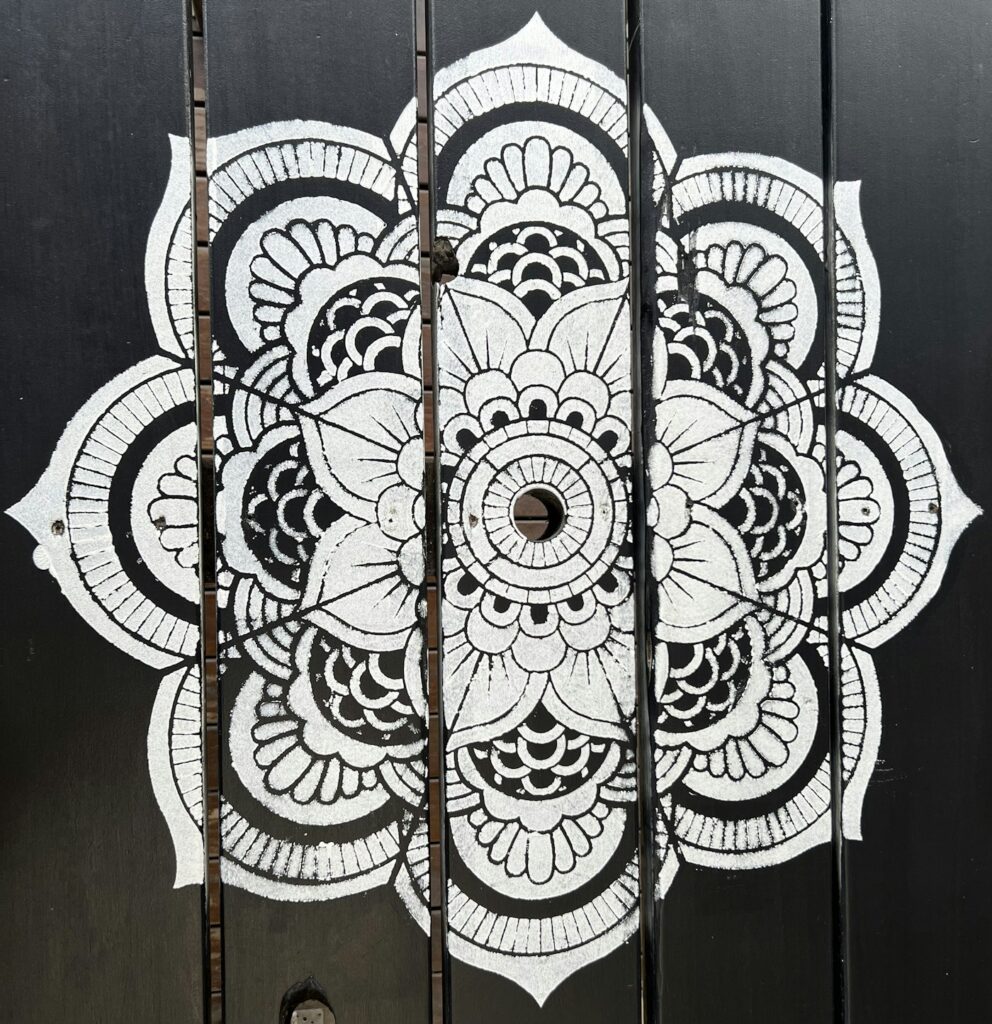 Geometric tattoo inspiration: hand drawn black and white mandala