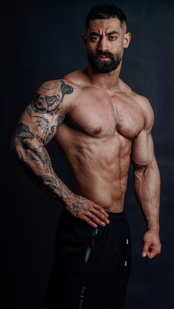 Half sleeve tattoo on a muscular man