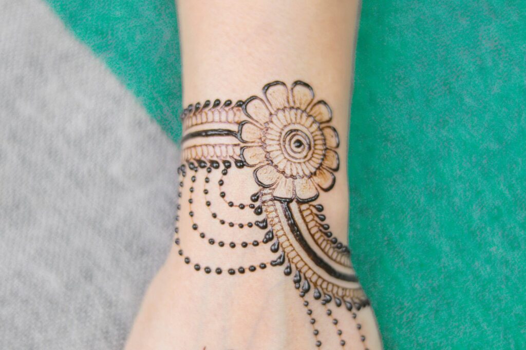 Jewelry style henna bracelet with a mandala on the wrist