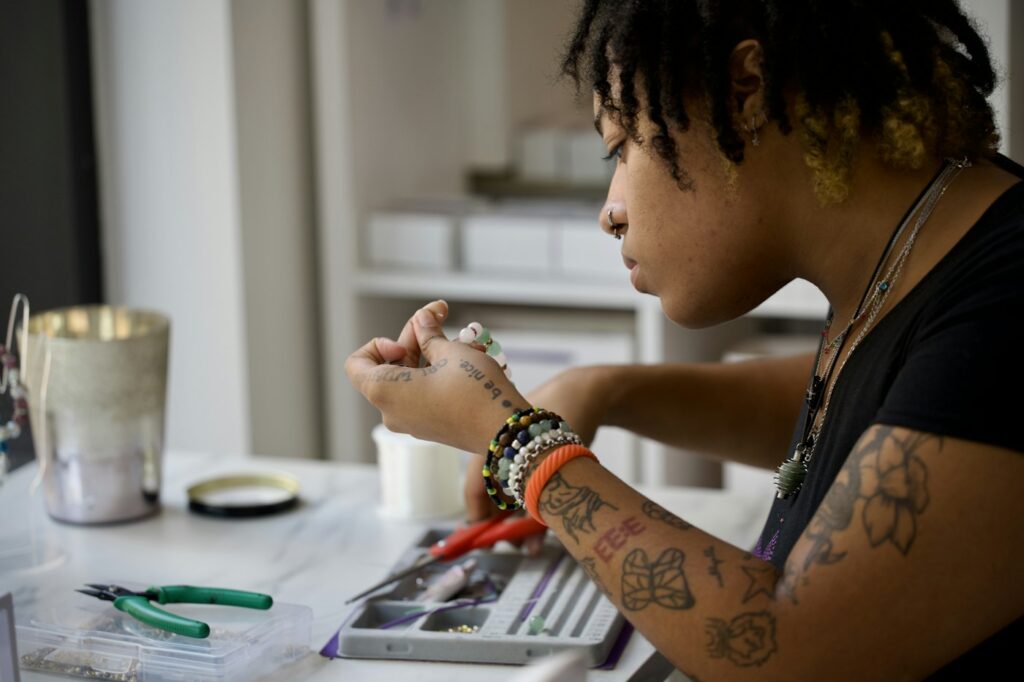 Illustrative tattoos covering a woman's forearm