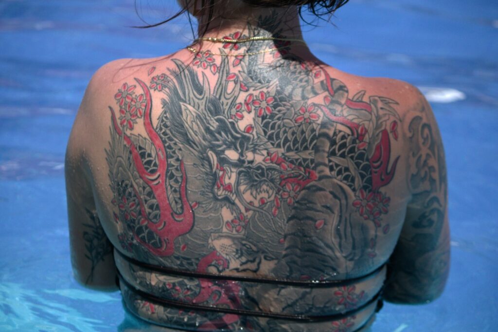 Japanese style full back tattoo on a woman