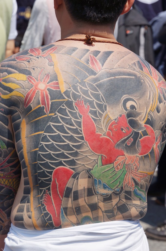 Japanese tattoo of Kintaro fighting a giant carp