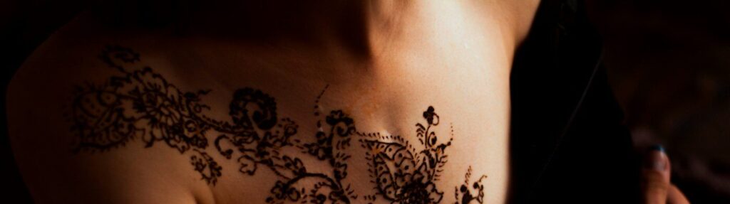 Lace style floral chest piece on a woman
