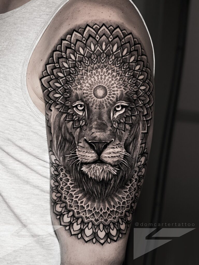 Lion head with mandala dotwork tattoo