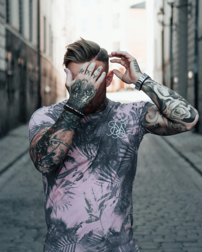 Tattoo ideas for men: man with full sleeve tattoos