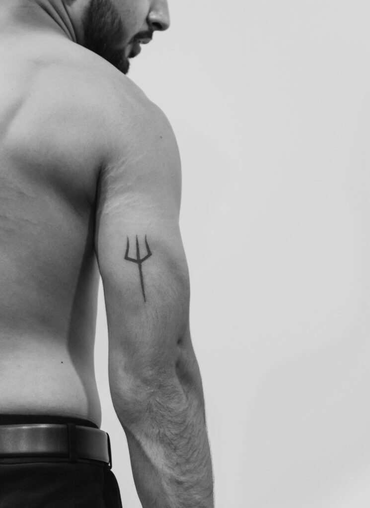 Minimal fine line tattoo on the arm