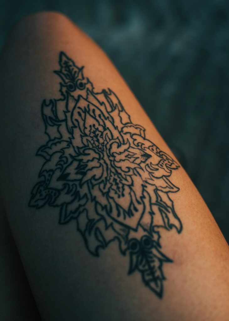 Ornamental blackwork tattoo on the forearm