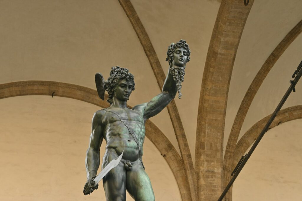 Statue of Perseus holding the head of Medusa
