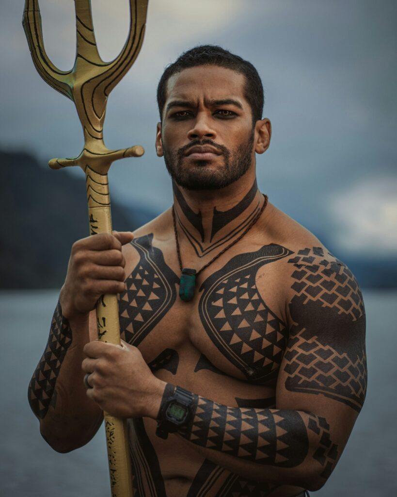 Tribal tattoo: Polynesian design on the chest, shoulders and arms