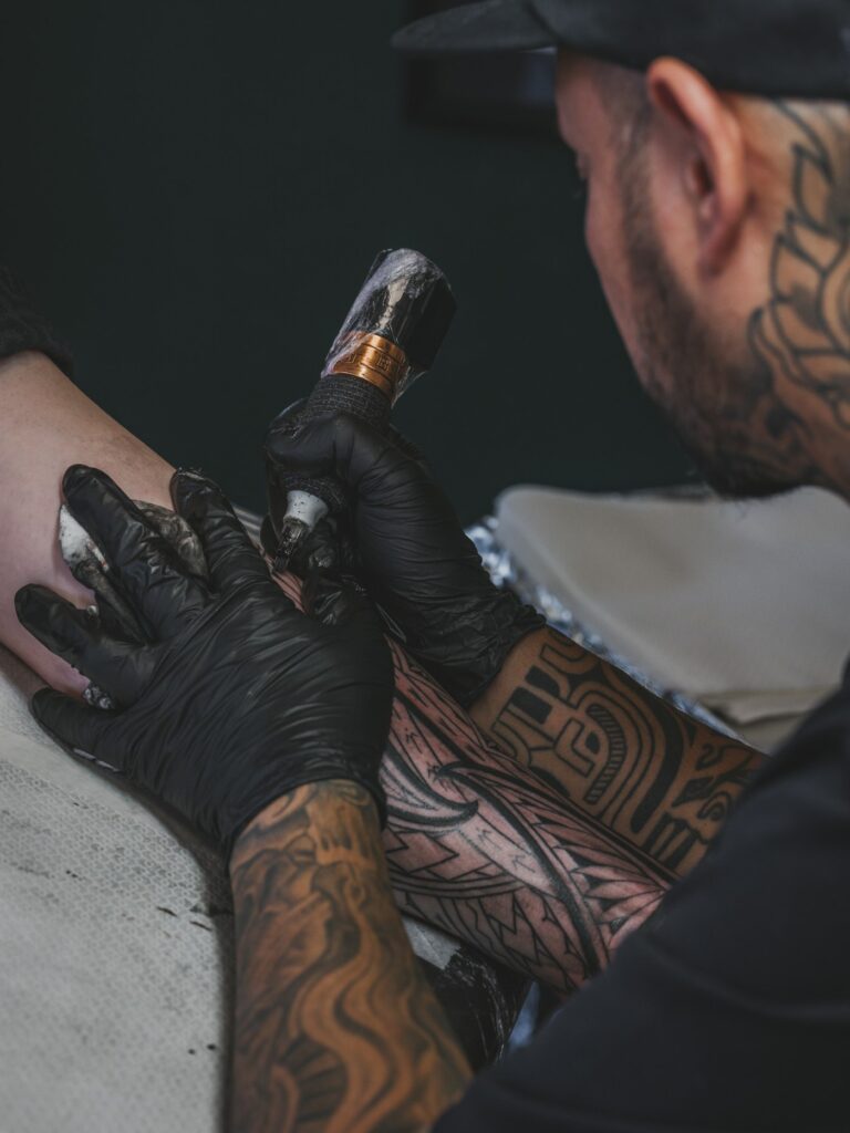 Polynesian tribal forearm tattoo in progress