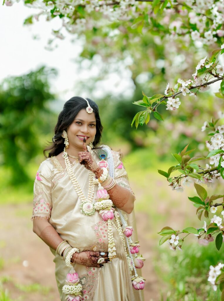 Pregnant woman in traditional dress at a baby shower celebration