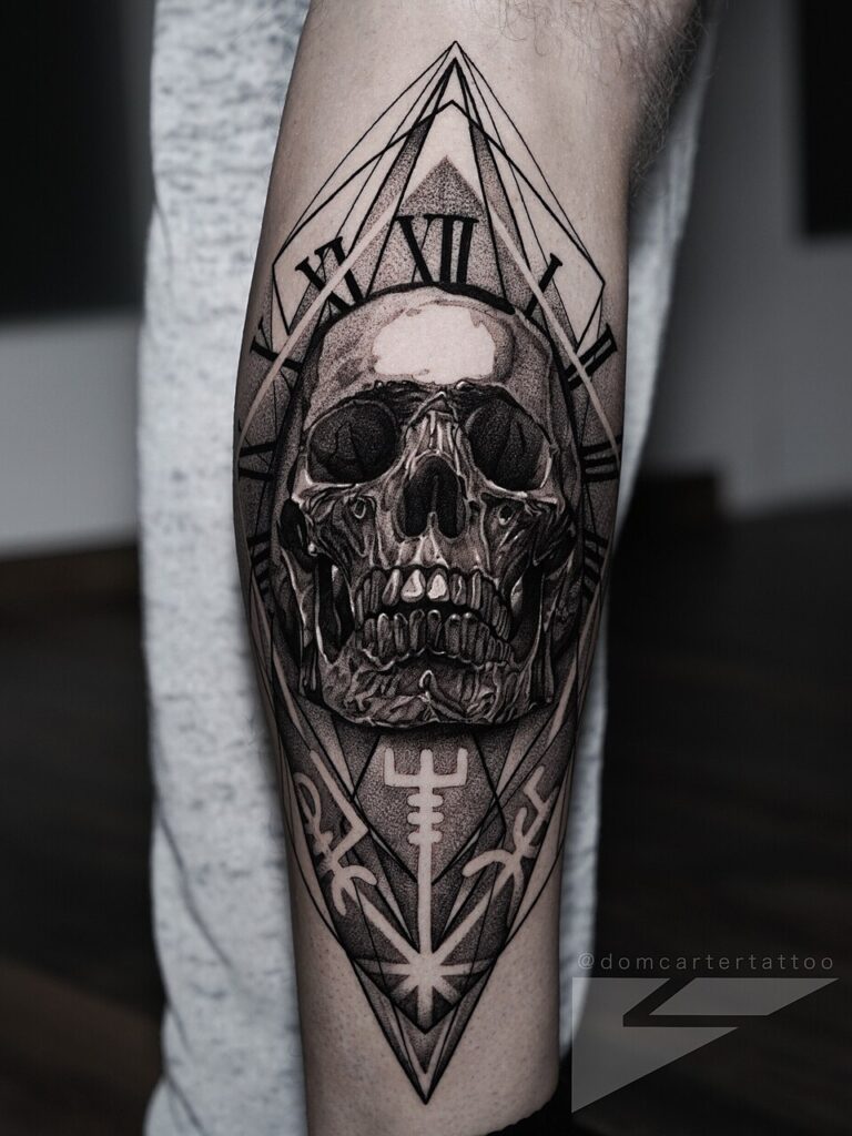 Realistic black and grey skull tattoo