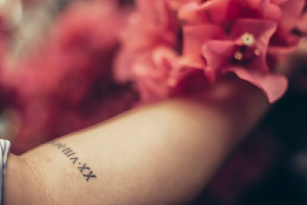 Roman numeral date tattoo on the wrist