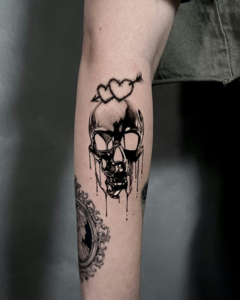 Skull tattoos for men: skull on a man's forearm