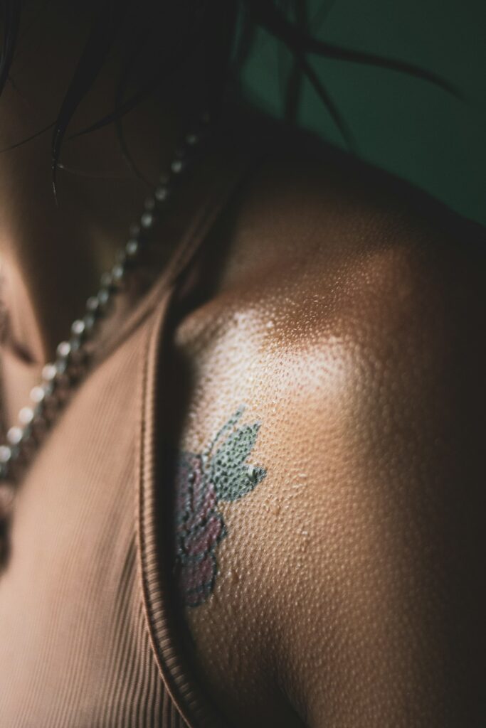 Small tattoo on the collarbone