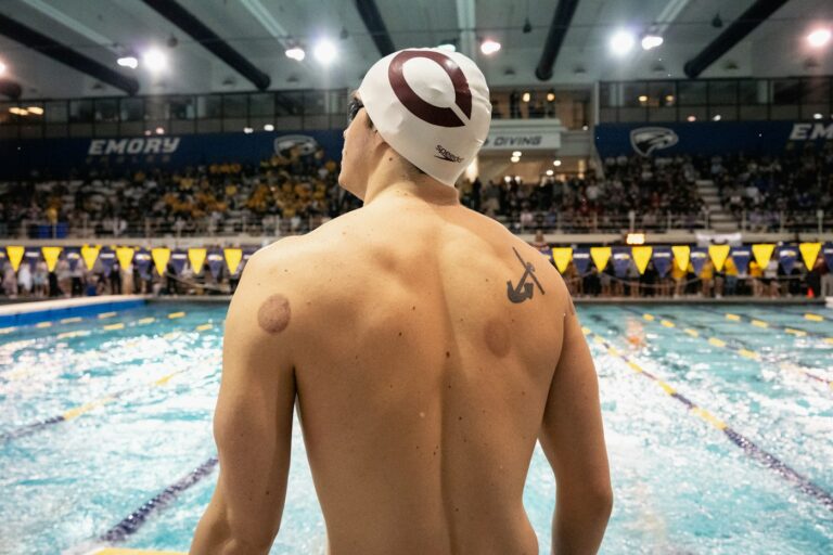 Swimming after a tattoo: competitive swimmer with a shoulder tattoo at an indoor pool