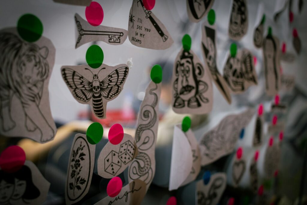 Tattoo flash designs drawn on paper