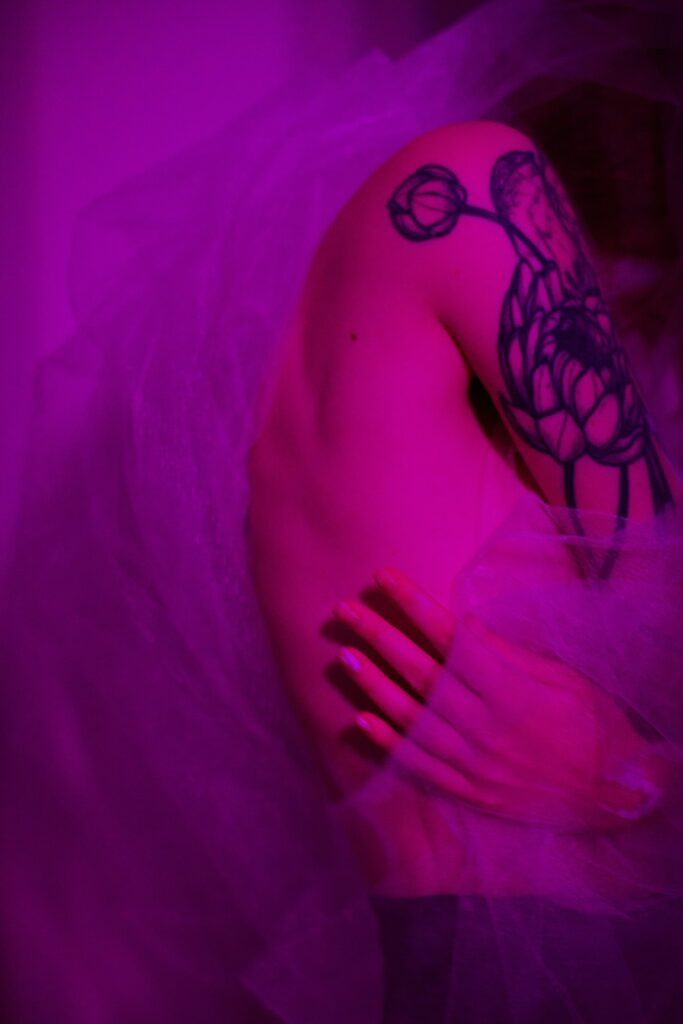 Tattoo stencil: purple transfer style design on the shoulder