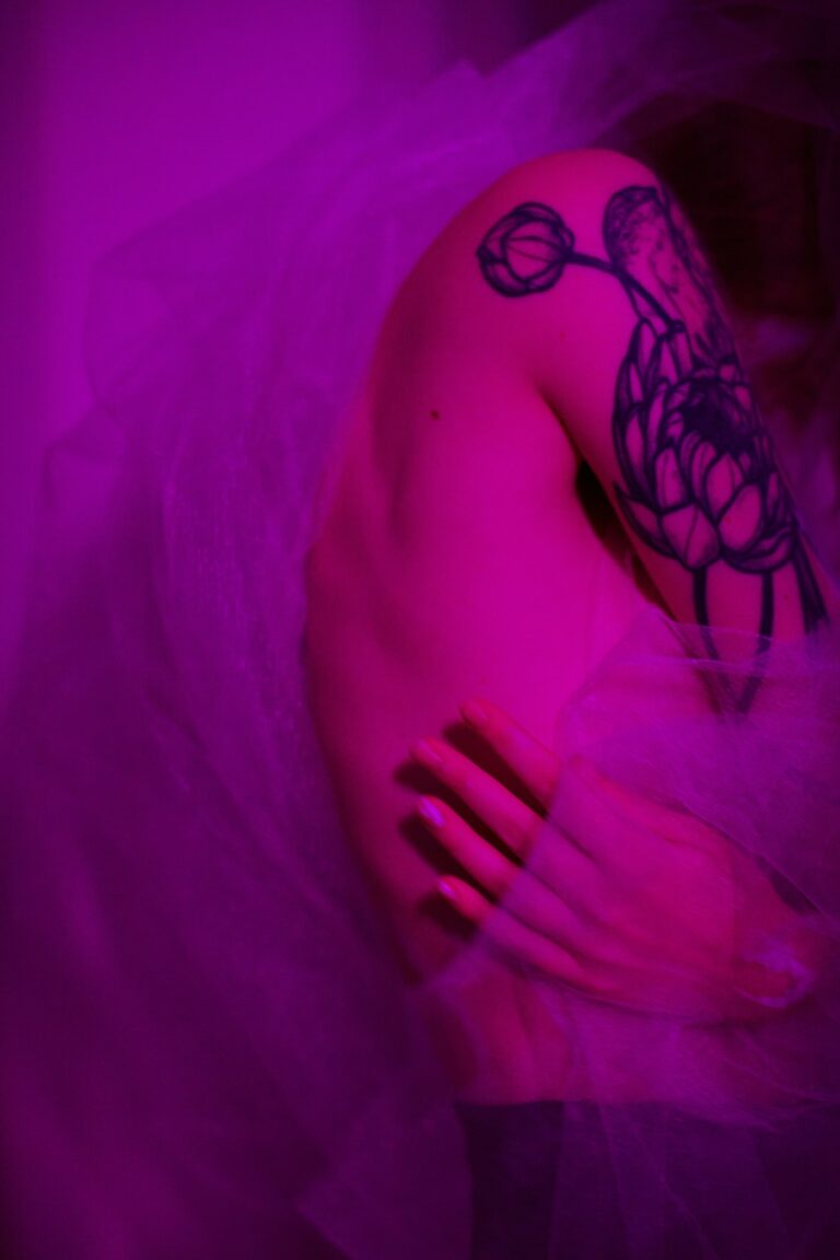 Tattoo stencil: purple transfer style design on the shoulder