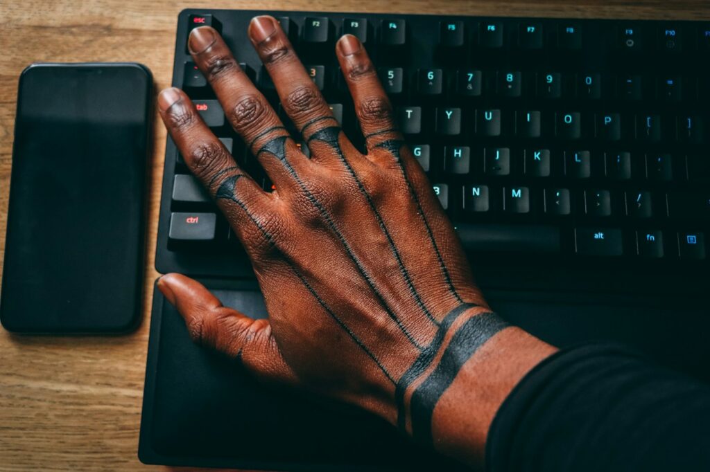 Tattooed hands and fingers
