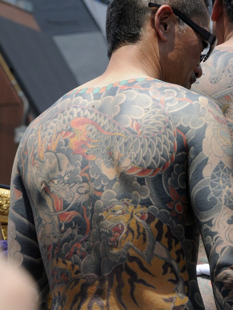 Japanese tattoo of a tiger and dragon