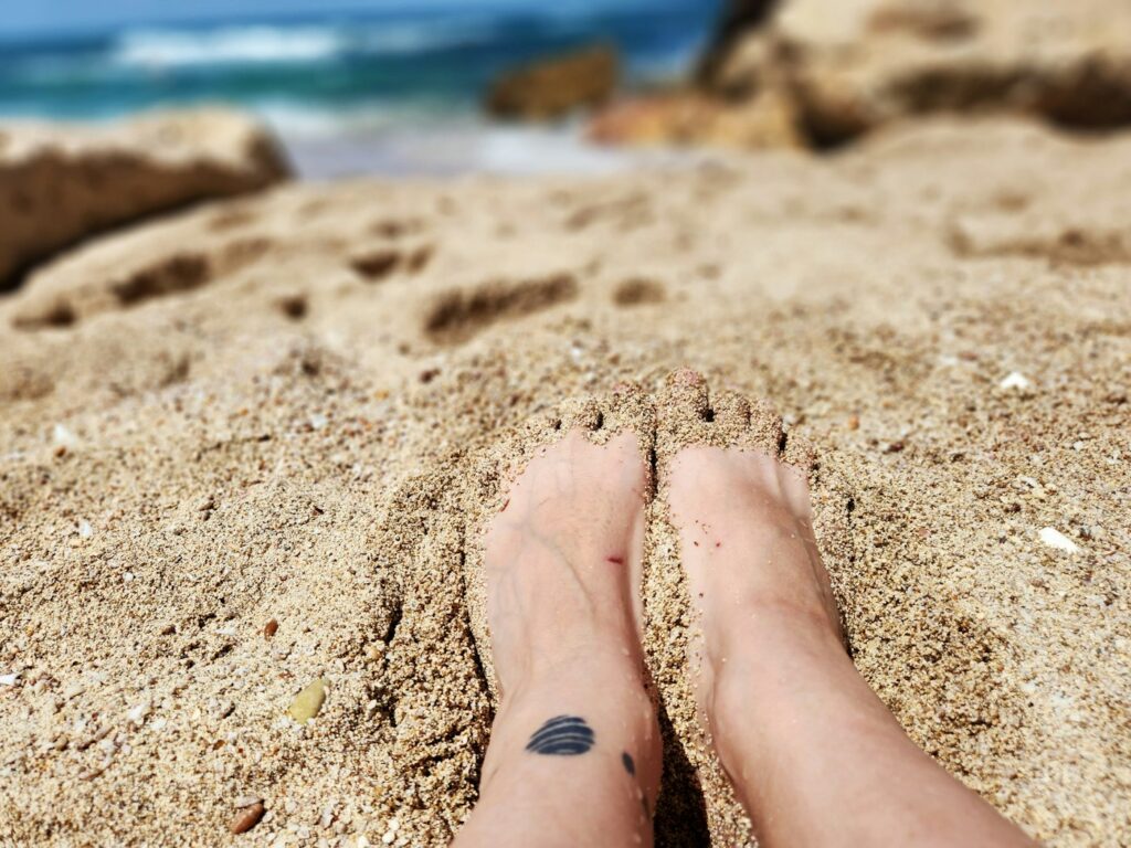 Leg tattoos for women: tiny tattoo on the top of the foot
