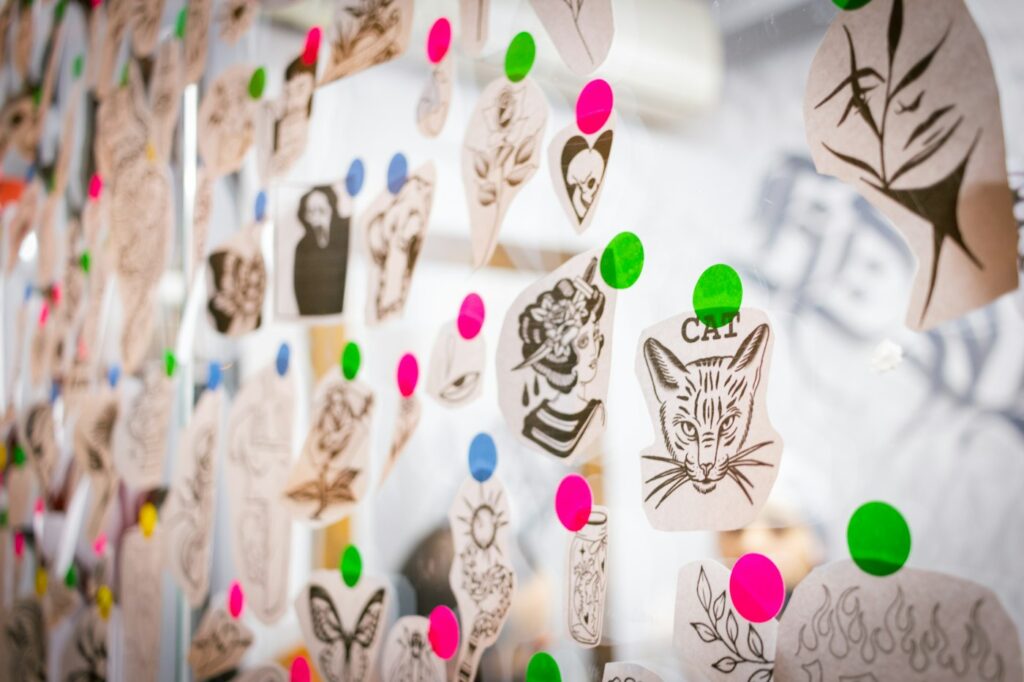Traditional tattoo flash: wall covered with tattoo flash designs