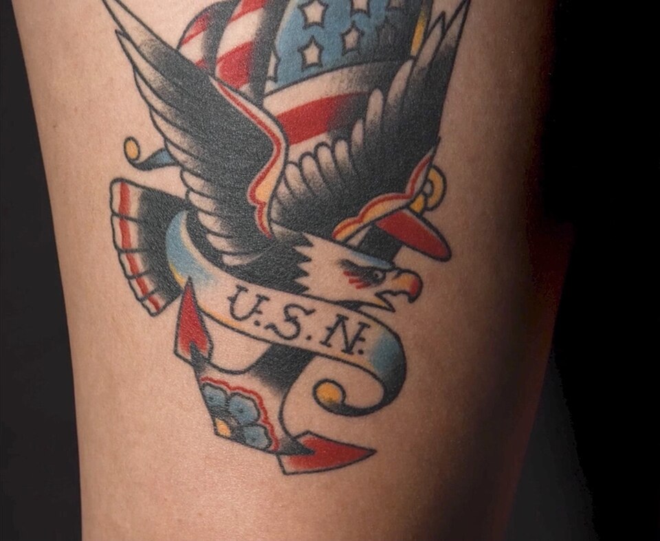 American traditional eagle tattoo with flag and USN banner