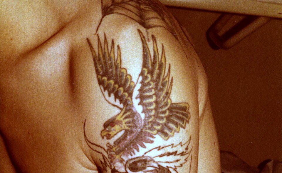 Vintage 1970s eagle tattoo on the upper arm by Herbert Hoffmann