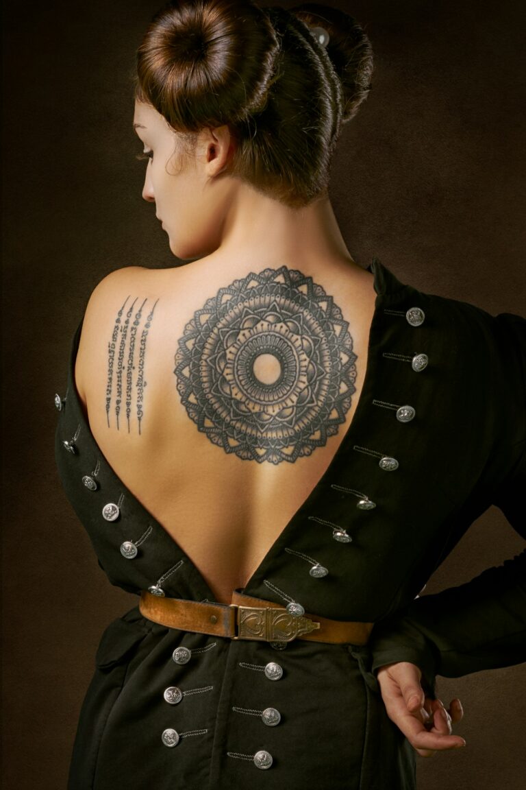 Tattoo ideas for women: mandala tattoo on the upper back