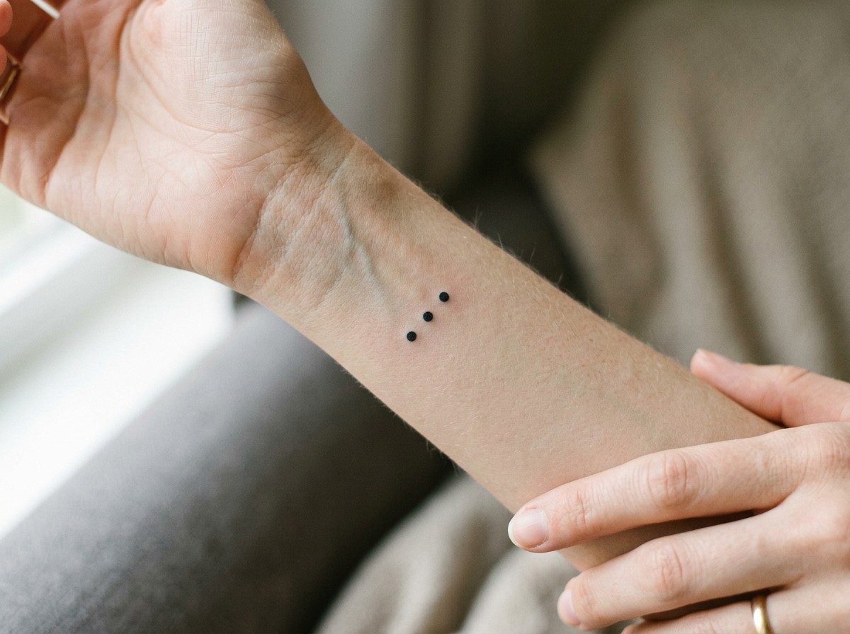 3 dot tattoo meaning: three dots in a line on the inner wrist